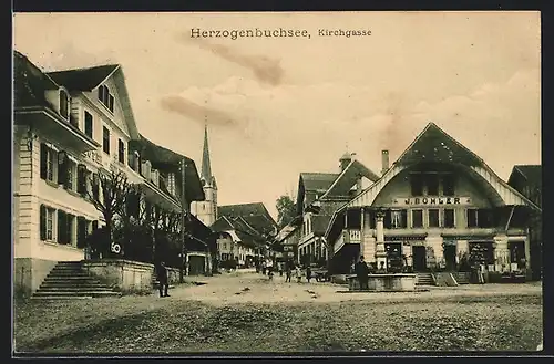 AK Herzogenbuchsee, Kirchgasse mit Hotel, Porzellangeschäft Bühler und Kirche