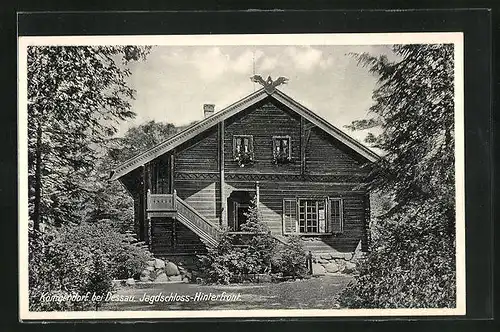 AK Dessau, Gasthaus Jagdschloss mit Garten im Sonnenschein