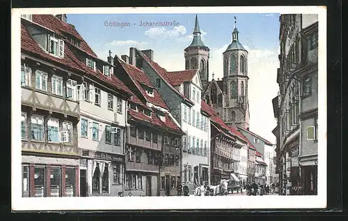 AK Göttingen, Geschäftshäuser und Kirche in der Johannisstrasse