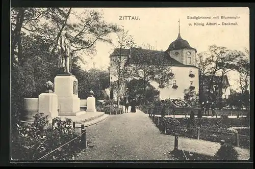 AK Zittau i. Sa., Stadtgärtnerei mit Blumenuhr und König Albert-Denkmal
