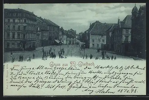 Mondschein-AK M.-Gladbach, Strassenpartie mit Gasthaus und Passanten