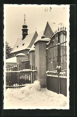 AK Brandýs nad Labem, Blick zur verschneiten Kirche