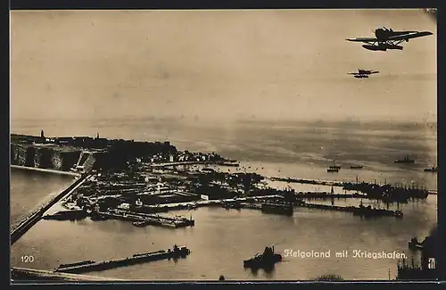 AK Helgoland, Kriegshafen mit Schiffen aus der Vogelschau, Flugzeug in der Luft