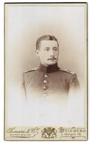 Fotografie Samson & Co., Duisburg, Portrait Soldat in Uniform mit Schnurrbart