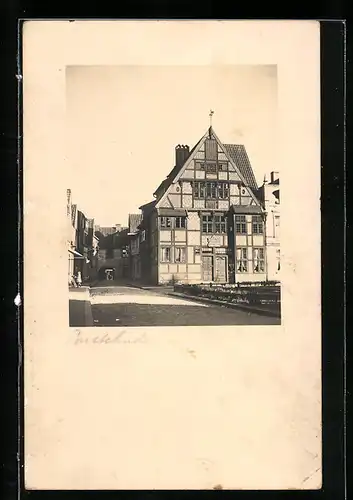 AK Buxtehude, Strassenpartie an einem alten Fachwerkhaus