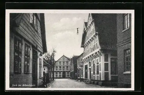 AK Jork / Altes Land, Strassenpartie mit Fachwerkhäusern