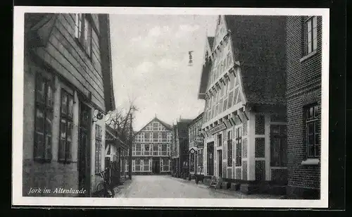 AK Jork / Altes Land, Strassenpartie mit Fachwerkhäusern