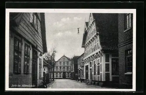 AK Jork / Altes Land, Strassenpartie mit Fachwerkhäusern