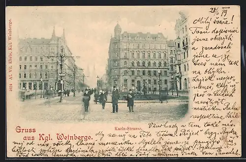 AK Prag / Praha-Král. Vinohradu, Passanten in der Karls-Strasse