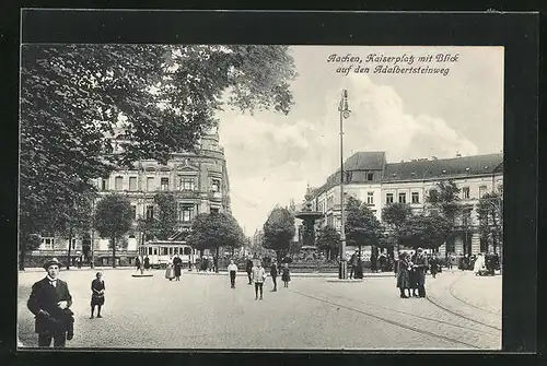 AK Aachen, Kaiserplatz mit mit Geschäft, Brunnen und Blick auf den Adalbertsteinweg