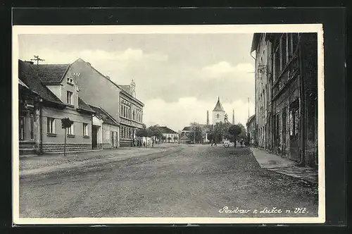 AK Luzec N.V., Ortsansicht mit Kirche im Zentrum