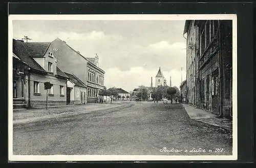 AK Luzec N.V., Ortsansicht mit Kirche im Mittelpunkt