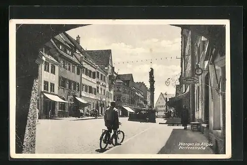 AK Wangen / Allgäu, Radfahrer auf der Herrenstrasse