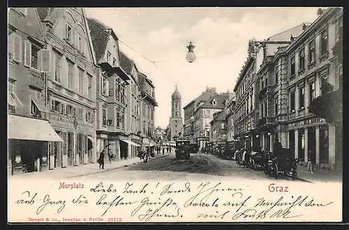 AK Graz, Murplatz mit Geschäften und Strassenbahn