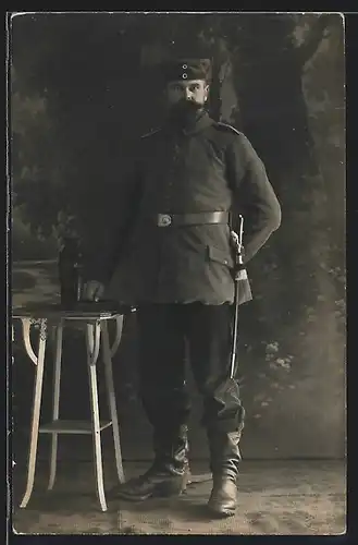 Foto-AK Soldat Wilhelm Rohde in Uniform Landwehr Brig. Rgt. 33 mit Bajonett