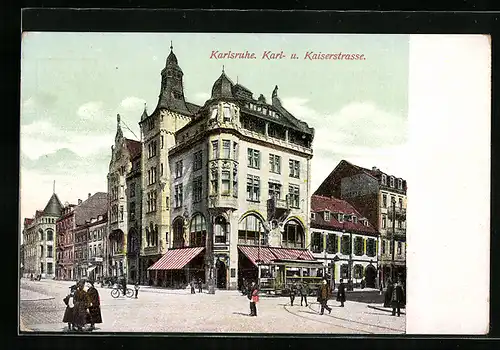 AK Karlsruhe, Blick in die Karl- u. Kaiserstrasse mit Geschäften, Strassenbahn