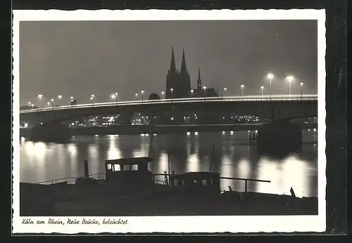AK Köln, neue Brücke bei Beleuchtung