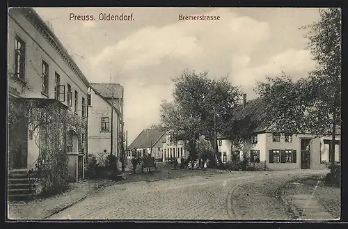 AK Preuss. Oldendorf, Bremerstrasse mit Fuhrwerk und Kindergruppe