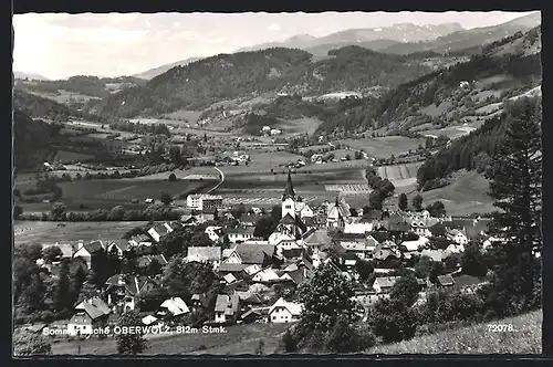 AK Oberwölz, Gesamtansicht mit Kirche und Blick auf die Berge