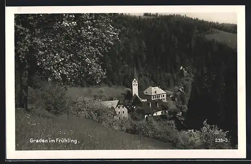 AK Graden, Ortspartie mit Kirche im Frühling