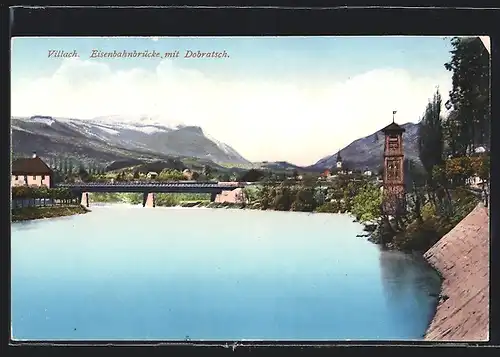 AK Villach, Eisenbahnbrücke mit Dobratsch