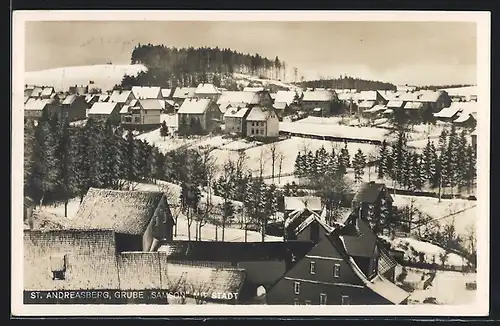 AK St. Andreasberg /Harz, Grube Samson mit Stadt im Winter
