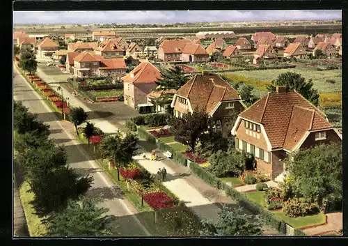 AK Wiesmoor /Ostfr., Blumenschmuck an der Hauptstrasse