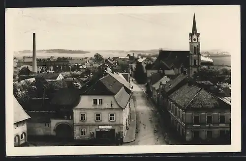 AK Reichstadt, Strassenpartie mit Kirche