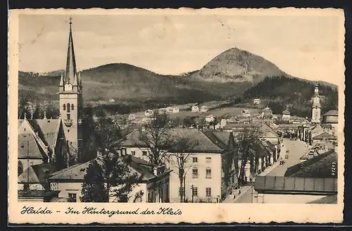 AK Haida, Strassenpartie mit Kirche, Im Hintergrund der Kleis