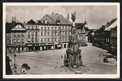 AK Neuhaus, Strassenpartie mit Denkmal und Geschäften