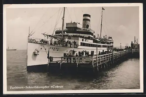 AK Passagierschiff Turbinen-Schnelldampfer Cobra am Hafen