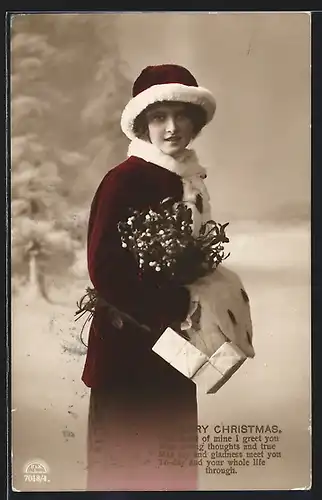 Foto-AK R & K / L Nr. 7018/4: Junge Frau mit Geschenken und Mistelzweig, A Merry Christmas