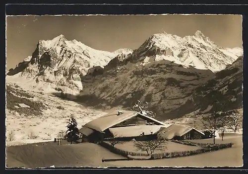 AK Grindelwald, Ortsansicht mit Wetterhorn, Berglistock, Mettenberg und Schreckhorn