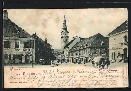AK Klagenfurt, Die Wodleystrasse mit der Handlung von Julius Ivanetic und Kirche