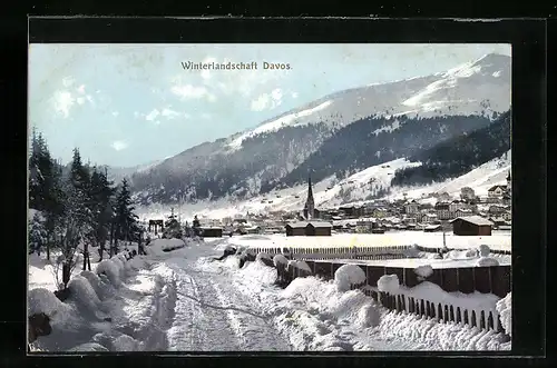 AK Davos, Ortsansicht mit Winterlandschaft