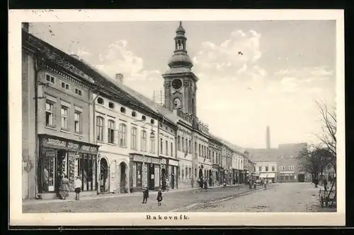 AK Rakovnik, Strassenpartie mit Geschäften im Zentrum