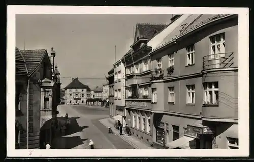 AK Mnichovo Hradiste, Strassenpartie mit Restaurant und Geschäften