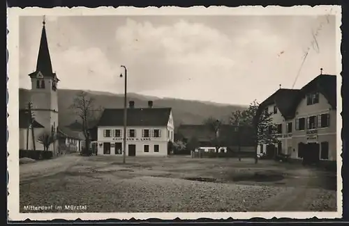AK Mitterdorf im Mürztal, Gasthof zur Post mit Geschäft von H. Lang und Kirche