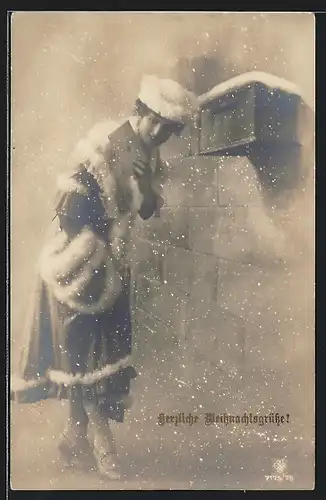 AK Junge Frau wirft einen Brief in den Briefkasten, Herzliche Weihnachtsgrüsse