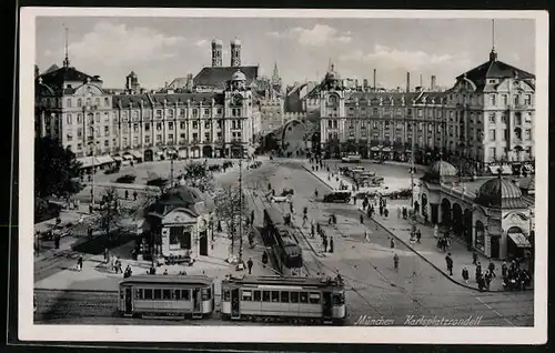 AK München, Karlsplatzrondell mit Geschäften und Strassenbahn