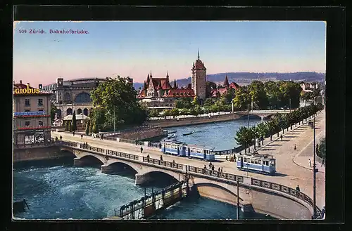 AK Zürich, Strassenbahnen passieren die Bahnhofbrücke