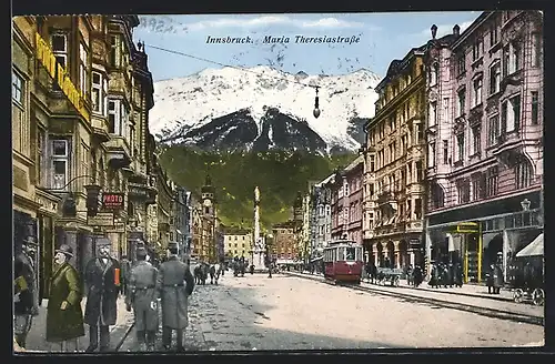 AK Innsbruck, Maria Theresiastrasse mit Fotogeschäft und Strassenbahn