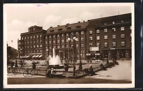 AK Mähr.-Ostrau, Bahnhofstrasse mit Springbrunnen