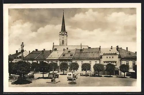 AK Mohelnice, Strassenpartie mit Denkmälern