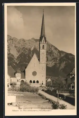 AK Schaan, Kirchturm mit Dreischwesterngruppe im Hintergrund