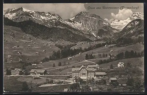 AK Unterwasser b. Toggenburg, vereinzelte Gebäude im Tal, Blick gegen Gebirgsmassiv