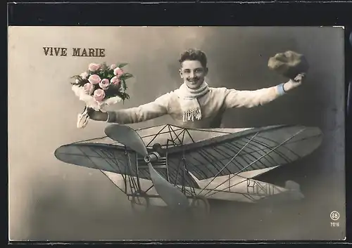 AK Vive Marie, Junger Mann mit Rosen auf einem kleinen Flugzeug