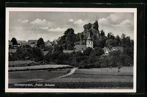 AK Wichsenstein /Fränk. Schweiz, Ortsansicht im Grünen vor Felsen