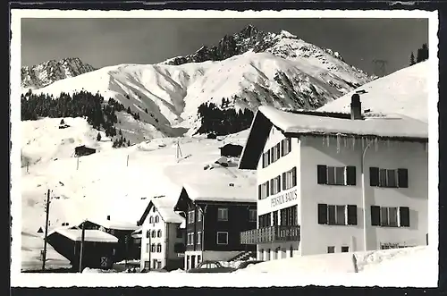 AK Rueras, Ortspartie mit Piz Culmatsch und Crispalt im Winter