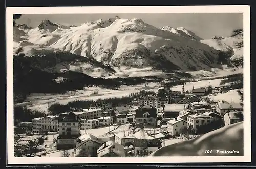 AK Pontresina, Blick über verschneite Ortschaft gegen Berge